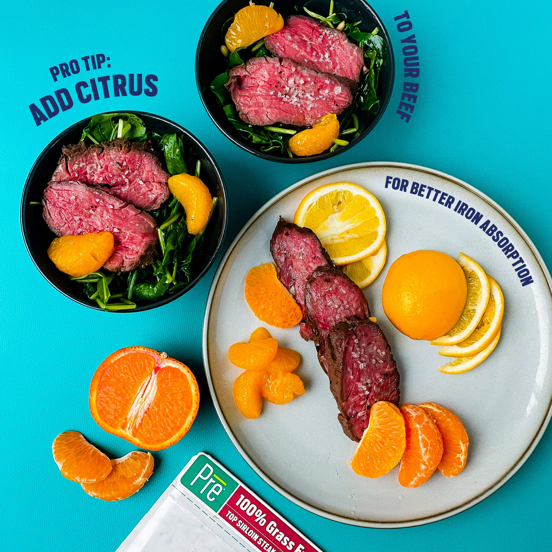 3 plates with steak slices and slices of oranges and small mandarin oranges places around them and on them. The bowls nearby have salad and steak with the oranges atop the salad. There is a package of Pre beef nearby that is a top sirloin steak.