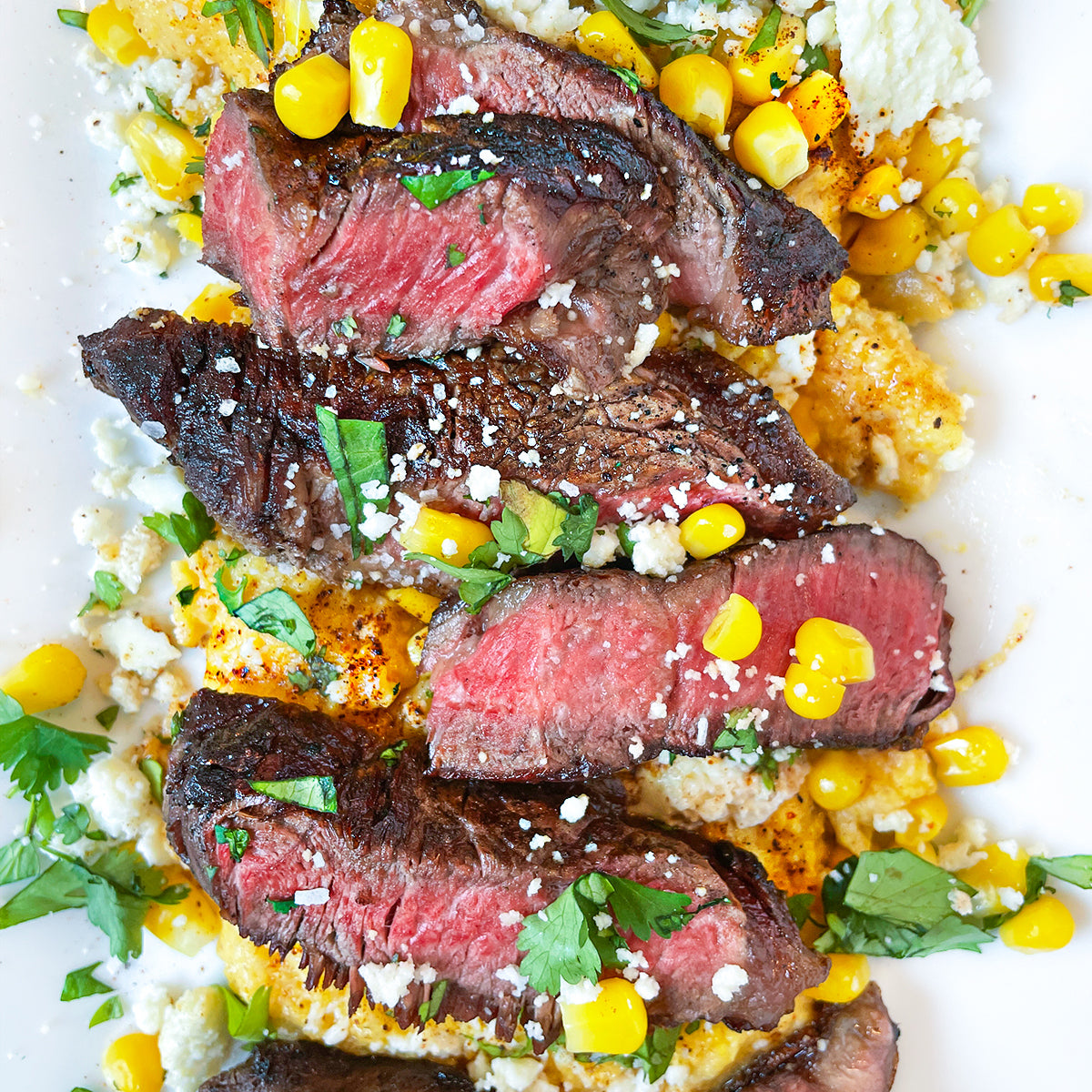 Grilled New York Strip with Creamy Elote Polenta