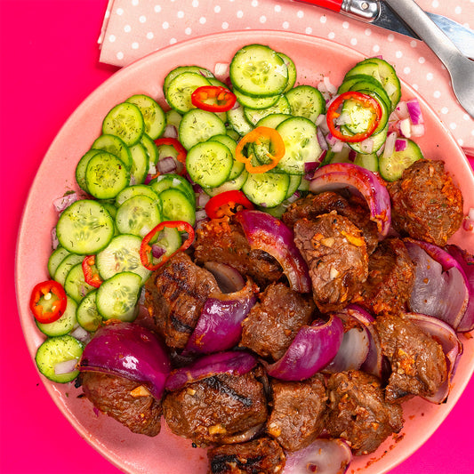 Mishkaki Kabobs with Grilled Lemons and Cucumber Salad