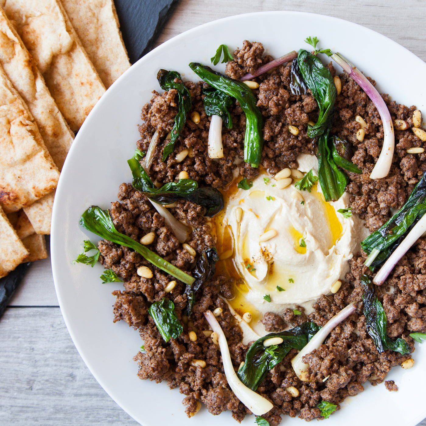 Cumin Spiced Beef and Hummus with Sautéed Ramps