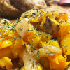 A close up of sweet potatoes with herbs