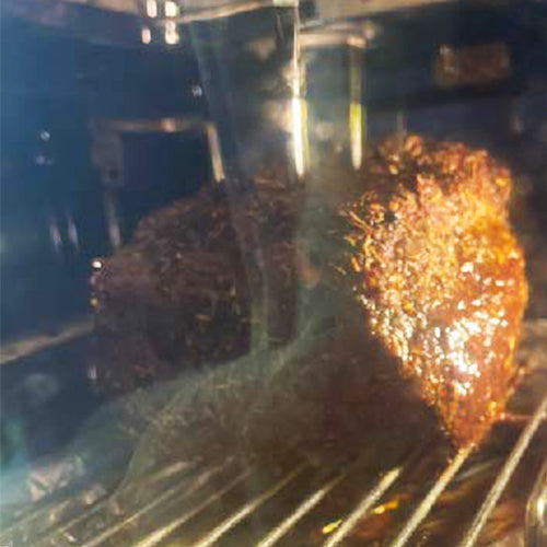 A roast inside an oven
